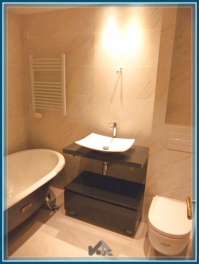 reforma de baño con porcelánico gris estilo contemporáneo Valencia